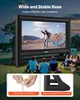 An inflatable movie screen set up outdoors at dusk, with people sitting and watching a movie. Náhľad obrázku produktu