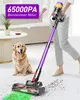 A person is using a cordless vacuum cleaner in a living room, with a dog sitting nearby. Produktbild-Vorschau