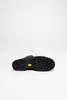 The bottom view of a brown hiking boot with a black sole and a yellow Vibram logo. Anteprima dell’immagine prodotto
