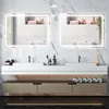 A modern bathroom vanity with two sinks, illuminated mirrors, and storage drawers. Náhled obrázku produktu