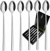 A set of six long-handled spoons displayed in a gift box, with four spoons standing upright in front of the box and two more visible inside the box. Produktbild-Vorschau
