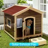 A dog house with a solar-powered exhaust fan and a solar panel attached. Produktbild-Vorschau