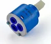 A close-up studio shot of a ceramic cartridge for a faucet. Produktbild-Vorschau