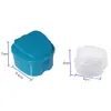 Two denture cleaning boxes are shown against a white background, with dimensions indicated by measurement lines and text. Produktbild-Vorschau