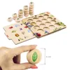 A wooden memory game with nature-themed illustrations and wooden tokens. Anteprima dell’immagine prodotto