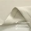 Close-up of beige fabric with text overlays highlighting product features. Produktbild-Vorschau