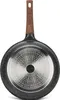 The underside of a frying pan with a wooden handle. Produktbild-Vorschau