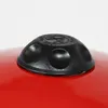 A close-up of a red object with a black cap on top. Produktbild-Vorschau
