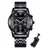 A black wristwatch with a metal band and a black dial, shown against a white background. A small tool for adjusting the watch band is also visible to the right. Produktbild-Vorschau