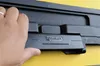 A hand is shown pressing on a black latch with the "STANLEY" logo on a yellow background. Voir les images du produit