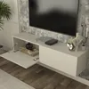 A wall-mounted TV lowboard with two doors, one open, displaying decorative items and electronics. Anteprima dell’immagine prodotto