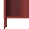 Close-up of the lower section of a red metal storage cabinet, showing its legs and the bottom shelf. Náhľad obrázku produktu