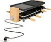 A raclette grill with a wooden base and a black grilling surface, shown on a white background. Produktbild-Vorschau