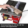 A person is using a table saw to cut a piece of wood. The saw is red and black, and the wood is brown. There is text on the bottom of the image. Náhľad obrázku produktu