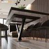A modern dining room with a table and chairs. Voir les images du produit
