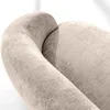 A close-up view of the textured fabric of a sofa. Produktbild-Vorschau