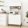 A white kitchen cabinet with storage shelves, a microwave, and glassware hanging from a rack. Náhled obrázku produktu
