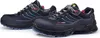 A pair of black safety shoes. Produktbild-Vorschau