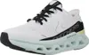 A white athletic shoe with black accents and a mint green sole. Voir les images du produit