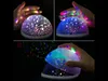 A collage of three images showing a star projector night light in use, with hands interacting with it and projecting stars onto surfaces. Anteprima dell’immagine prodotto