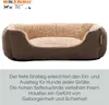 A brown dog bed with a plush beige interior, shown from a slightly elevated front-facing angle. Produktbild-Vorschau