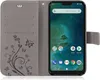 A flip cover wallet case for a Xiaomi Redmi Note 9 phone, shown open with the phone inside. Produktbild-Vorschau