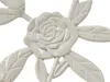 A close-up of a decorative metal rose with leaves. Náhľad obrázku produktu
