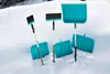 Several snow shovels are stuck in a snowdrift. Náhled obrázku produktu