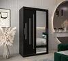 A bedroom scene featuring a black sliding door wardrobe with mirrored doors, next to a decorative vase and a framed picture. A vanity area with a mirror and lighting is visible in the background. Produktbild-Vorschau