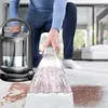 A person is using a carpet cleaner on a stained carpet. Náhled obrázku produktu