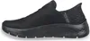 A side view of a black Skechers slip-on shoe. Produktbild-Vorschau