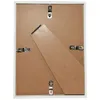 The back of a white picture frame is shown. Produktbild-Vorschau