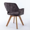A single upholstered chair with wooden legs, shown from a rear-diagonal angle against a white background. Produktbild-Vorschau