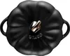 A black Staub cocotte with a gold handle, viewed from directly above. Produktbild-Vorschau