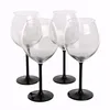 Four clear wine glasses with black stems and bases are arranged on a white background. Podgląd zdjęcia produktu