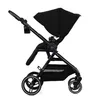 A black Kinderkraft Yoxi 3in1 stroller is shown from the side against a white background. Produktbild-Vorschau