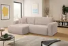 A modern living room with a large sectional sofa, coffee table, rug, and artwork. Produktbild-Vorschau
