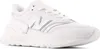 A white New Balance sneaker shown from the side. Podgląd zdjęcia produktu