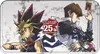 Two anime characters from Yu-Gi-Oh! are depicted, holding trading cards. A "Yu-Gi-Oh! Card Game 25th Quarter Century" logo is prominently displayed. Produktbild-Vorschau