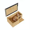 A ginger cat sleeps inside a wooden outdoor cat house with a removable roof. Náhled obrázku produktu