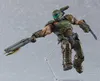 A collectible action figure of the Doom Slayer from Doom Eternal, posed dynamically with weapons. Náhľad obrázku produktu