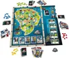 A board game laid out on a white surface, featuring a map of Isla Nublar from Jurassic World, game pieces, cards, and dinosaur figures. Produktbild-Vorschau