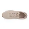A top-down view of a single beige sneaker. Produktbild-Vorschau