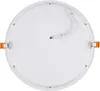 The back of a round, flat LED panel light with orange mounting clips and a white power cable. Produktbild-Vorschau