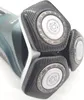 A close-up view of the shaving heads of a Philips electric shaver. Produktbild-Vorschau