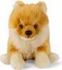 A plush toy dog sitting on a white background. Náhľad obrázku produktu