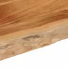 A close-up view of the edge of a wooden table. Produktbild-Vorschau