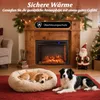 A cozy living room scene with a fireplace, Christmas decorations, and two dogs. Podgląd zdjęcia produktu
