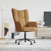 A brown velvet office chair is shown in a room with a floor lamp, abstract art, and a TV stand. Náhled obrázku produktu