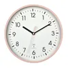 A close-up view of a wall clock. Produktbild-Vorschau